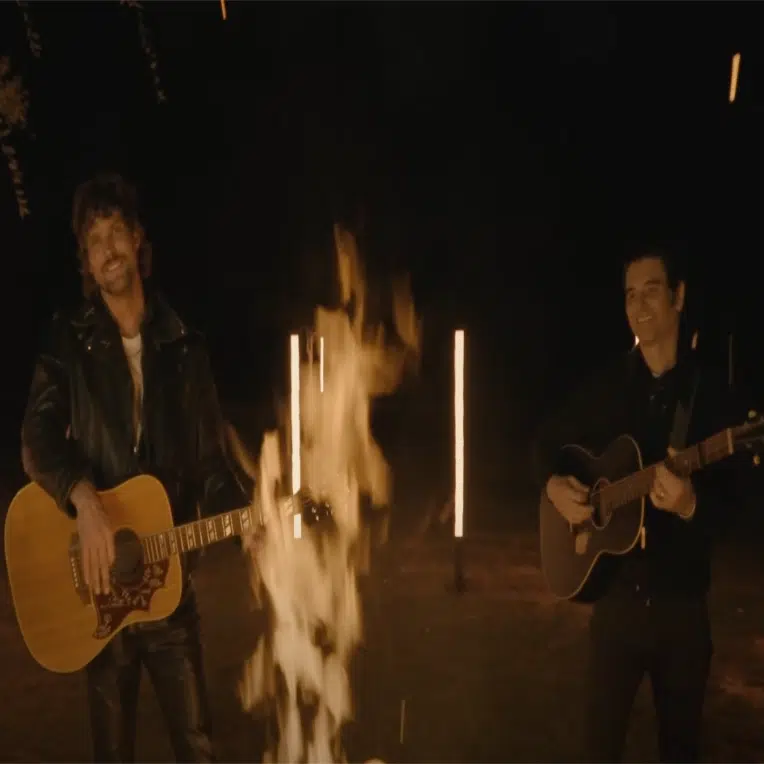 Still from Boys Like Girls & Dashboard Confessional's "Watch The Fire" music video.